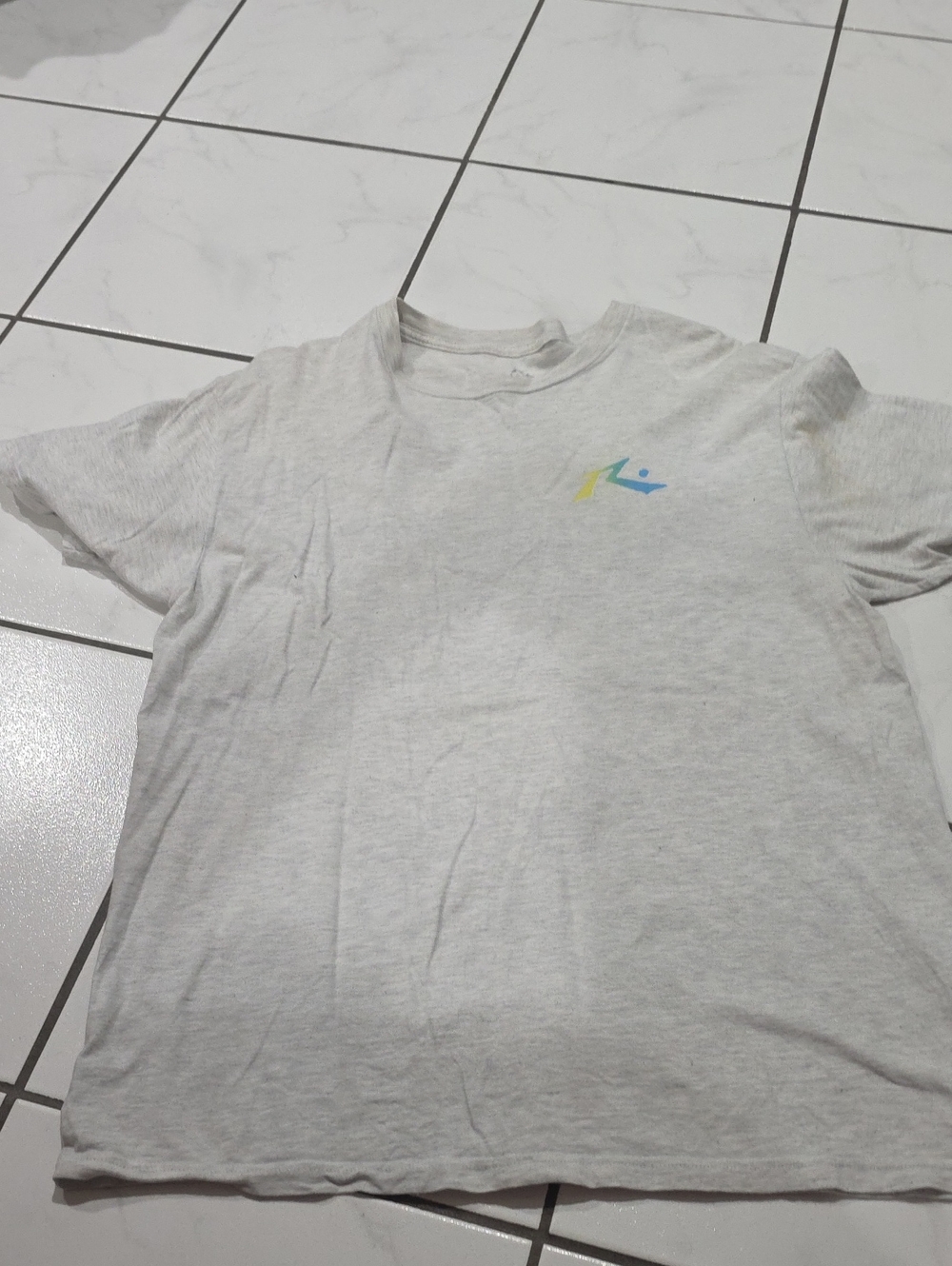 Rusty Light Gray Short Sleeve Tee with Blue and Yellow Logo